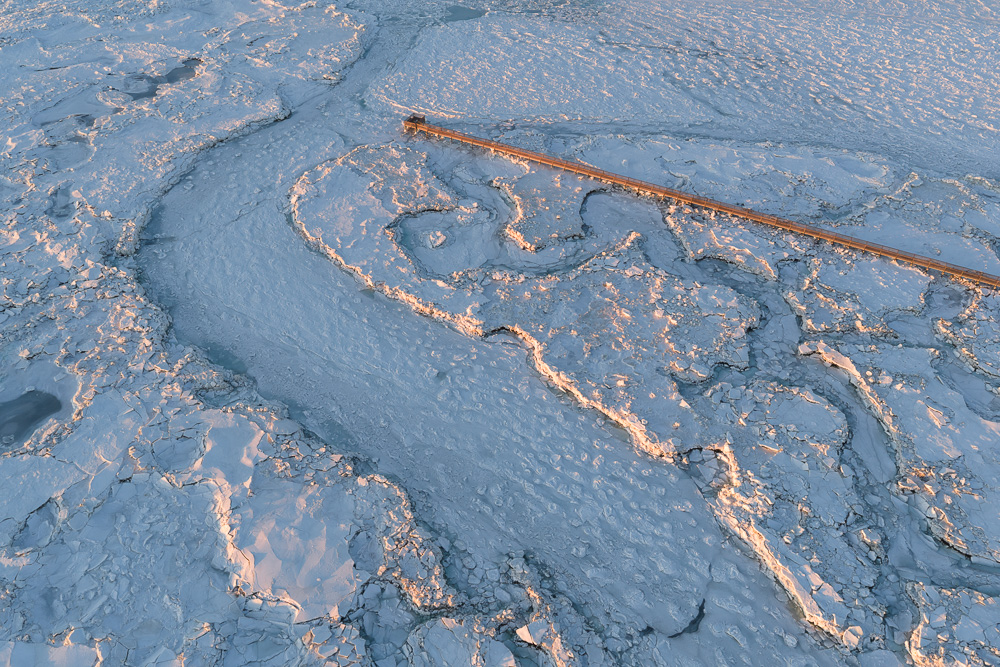 MAB-DJI-20260210-MA-YARMOUTH-GRAYS-BEACH-COVE-ICE-PATTERNS-SUNSET-0014.jpg